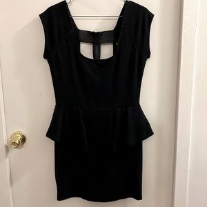 Little black dress. Strapped back with zipper.
